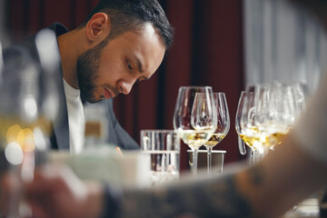 Sommelier degustate wine. Blind wine tasting. Training of restaurant staff, studying alcohol list. 