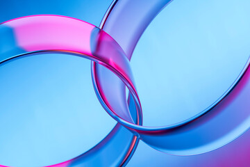 Abstract 3D glass rings with neon reflections on a colorful background