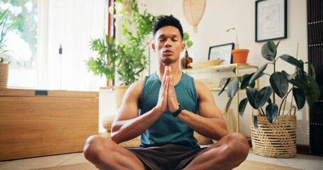 Man, namaste and meditation for yoga at house for fitness, zen balance and mindfulness in lounge....