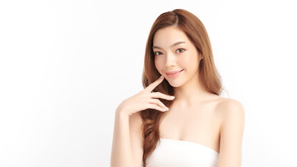 A beautiful young Asian woman with clean, fresh skin against a white background. Skincare, facial treatment, cosmetology, beauty, and spa. An elegant portrait of an Asian woman.