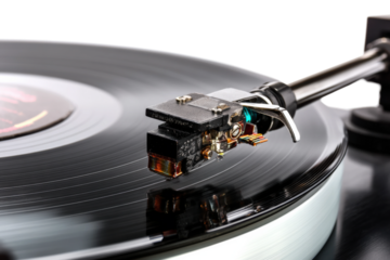 Close-up of vintage turntable stylus on spinning vinyl record, cut out