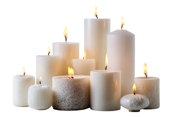 Assorted white candles in various shapes and sizes with flames, cut out