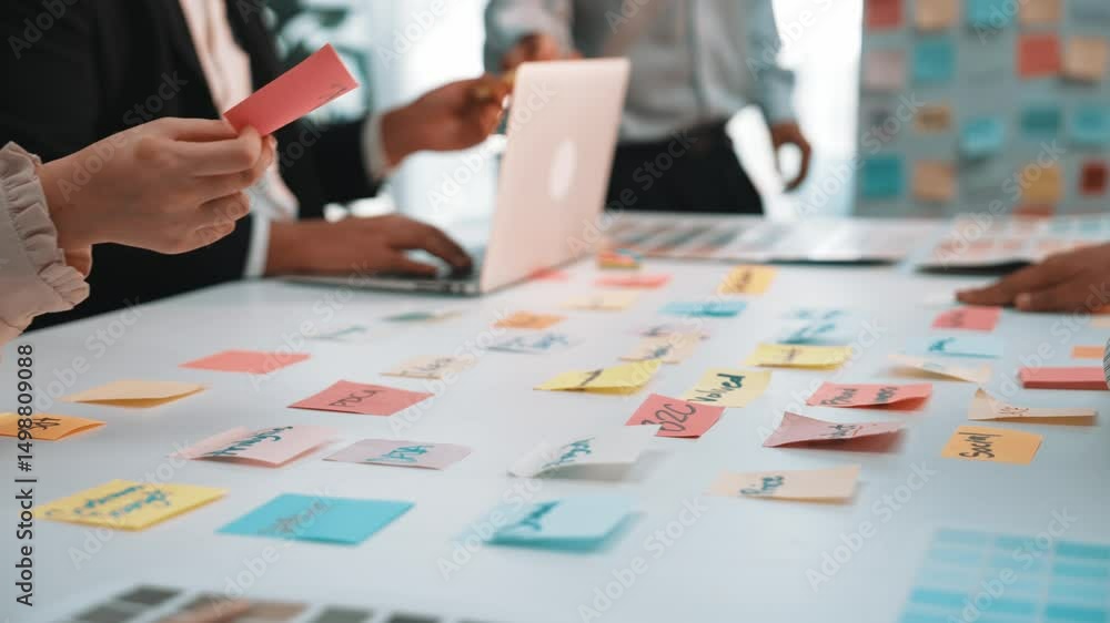 Aufkleber a dynamic office scene showcasing a creative brainstorming session with diverse professionals using 