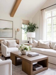 Cozy modern living room with natural light, elegant decor, and serene artwork on the walls