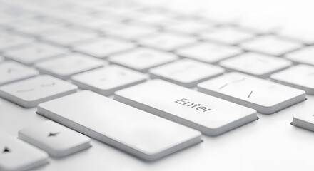 Clean white computer keyboard with Enter key in focus, concept for typing, data input, office work