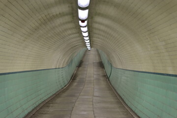Underground pedestrian and cycle tunnel beneath a river