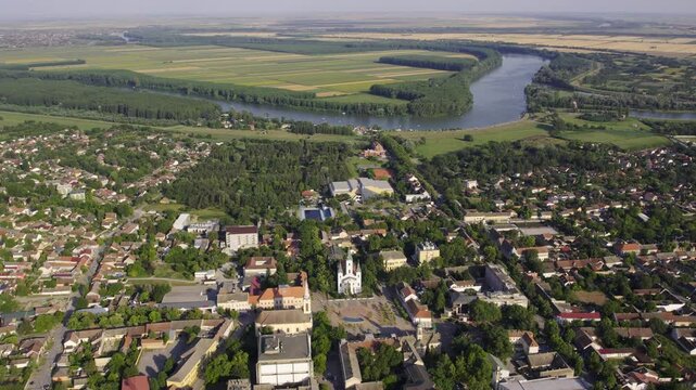 Exploring Becej from above with stunning landscapes and vibrant community life during a sunny day