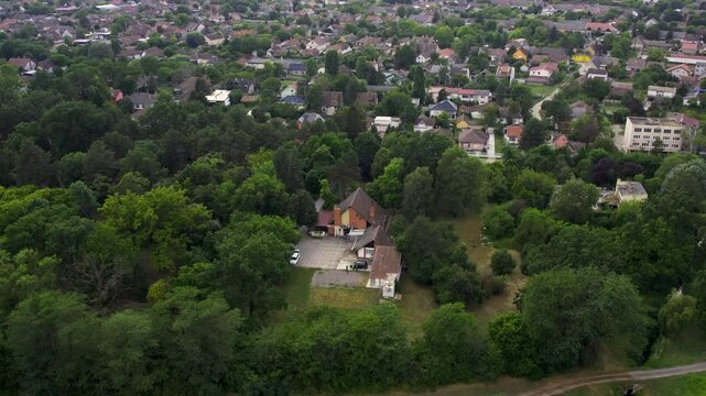 Exploring the lush green surroundings and homes of Becej nestled in nature's beauty and urban life