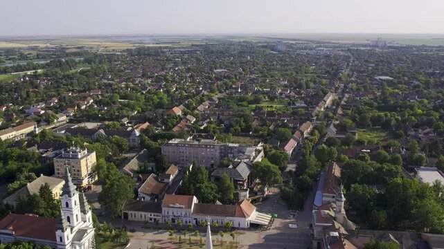 View of Becej showcasing the lush greenery and residential areas in the heart of Vojvodina during a clear afternoon