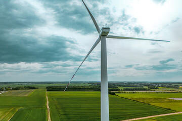 Turbine in open countryside with blue sky