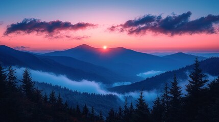 Obraz premium Majestic mountain sunset, mist-shrouded valleys