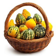 Assortment of colorful gourds and pumpkins brimming in a woven basket against a white background.