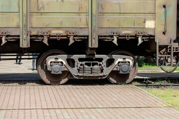 A train car with rusted metal on the front