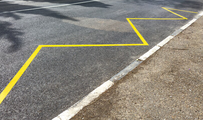 A yellow line is drawn on the road