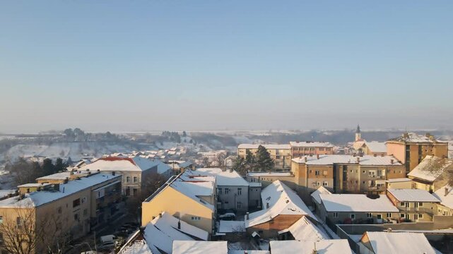 Winter morning in Irig Serbia showcasing snow-covered rooftops and serene landscapes