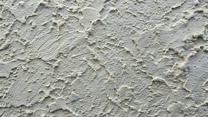 Close up texture of light gray stucco exterior wall surface