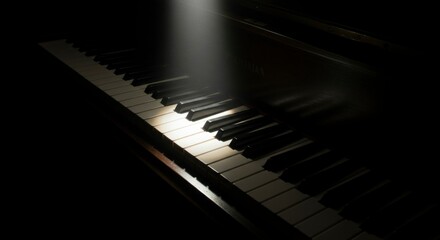 Naklejka premium Illuminated piano keys, dark background, spotlight effect. Music instrument, classic, elegant