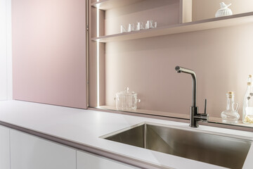 stylish modern built-in kitchen with upper and lower cabinets, drawers, shelves. kitchen facades...