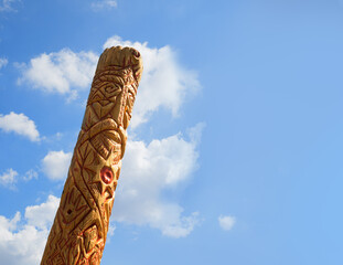 Old wooden idol in the field