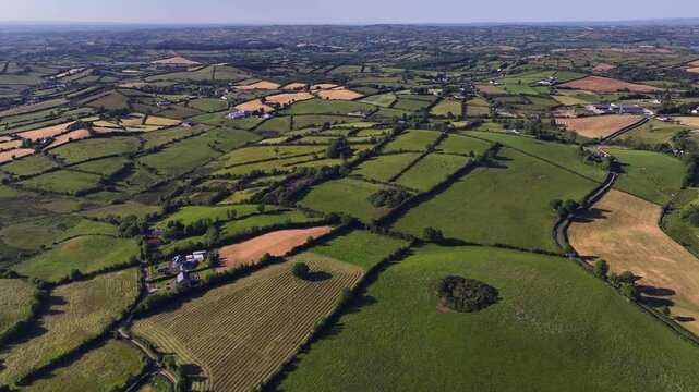 Corbeagh, County Cavan, Ireland, June 2023. Drone natural field Irish landscape textured backdrop with crop rows and pastures along rolling hills