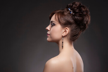 Winsome Caucasian Profile Of Beauty Woman Shot Isolated Over Black Background.