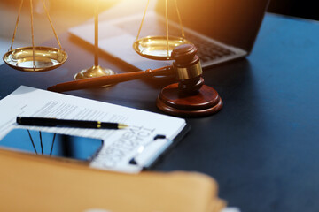 female business woman lawyers working at the law firms. Judge gavel with scales of justice. Legal...