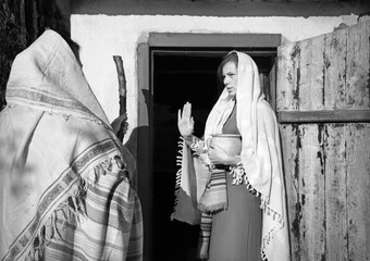 Girl in the door of her home