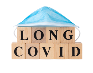 Wooden blocks spell out "LONG COVID" topped with a blue surgical mask.