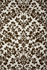 Obraz premium Elegant ornate floral damask pattern in dark brown and cream with intricate symmetrical leafy design perfect for backgrounds textiles and wallpapers