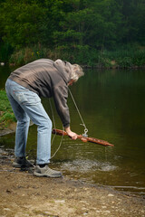 Senior citizen fishing with magnet in city lake found guns