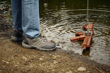 Senior citizen fishing with magnet in city lake found guns