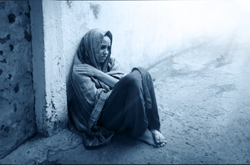 Frozen girl sitting on the floor