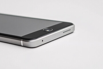 Close up of black mobile phone on white background