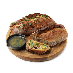 Tasty bread with garlic, herbs and oil isolated on white