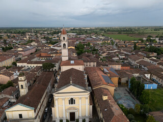 Aerial drone view of Abbazia dei Santi Tommaso e Andrea Apostoli bell tower rising above...