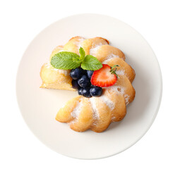 Tasty bundt cake with powdered sugar, berries and mint isolated on white, top view
