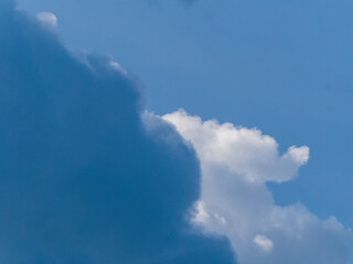 Contrasting Cloud Formations in a Blue Sky