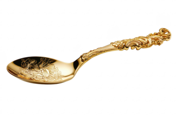 Intricately engraved floral gold spoon with decorative handle used for luxury dining settings isolated on a transparent background