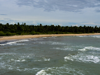 View of the Vattakottai beach from the Vattakottai Fort which is a fort constructed during the reign of the erstwhile kingdom of Travancore, Kanyakumari, Tamil Nadu. Selective focus on the water