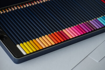 Set of color pencils in pencil case. Big beautiful color palette watercolor pencils for creativity drawing, close-up, high resolution.