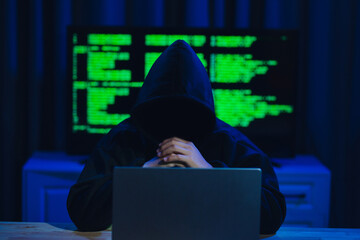 Hackers are in a dark room, wearing hats and warts, hacking government data servers to steal data...
