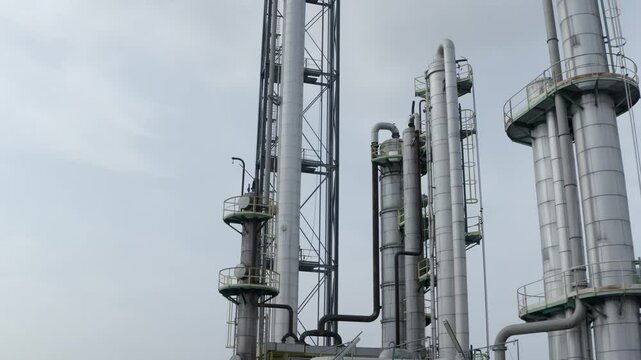 Aerial perspective over an extensive industrial factory, highlighting its smokestacks and production facilities in Veille Saint Girons, France