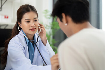 Health and Wellness. Doctor using a stethoscope to assess a patient's health.