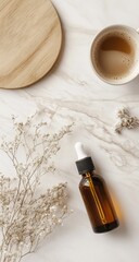 Amber serum with coffee, and marble.