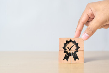 businessman's hand completed sign of top service quality assurance, guarantee, standards, ISO certification and standardization concept, advertising product and service quality commitment