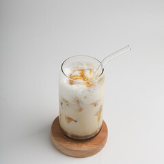 Milk coffee in a cup on white background