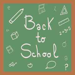 Handwritten back to school message on a green chalkboard surrounded by drawings of school supplies, symbolizing the start of the academic year