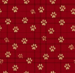 Golden paw print pattern on a red plaid background.