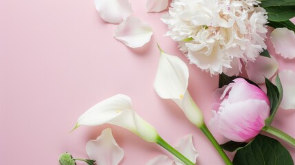 White Calla Lilies and pink Peonies on a clean, soft blush pink table, creating a timeless and sophisticated composition.