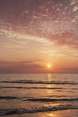 Obraz premium Serene Sunset Over the Ocean A Breathtaking View of Golden Hour